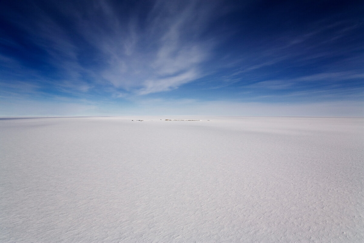 The polar plateau is a vast, featureless ice sheet