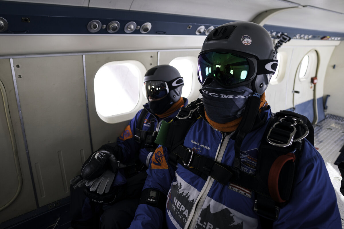 Skydive Antarctica guests sit inside the Twin Otter prior to their skydive jump