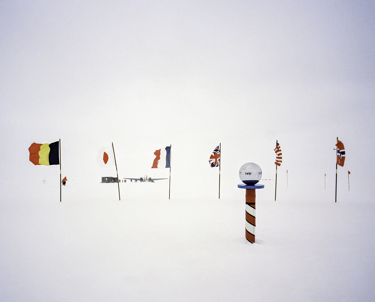 Ceremonial South Pole with Antarctic Treaty nation flags