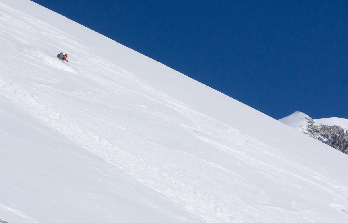 Skier descends a slope