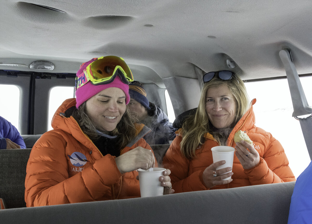 Guests enjoy hot cocoa and scones after an excursion to the Drake Icefall